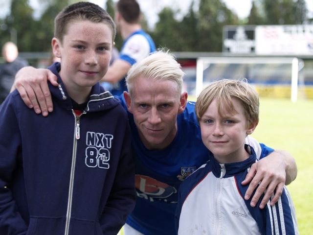 My grandsons Josh (left) and Cole (right) with Eastleigh FC captain Glen Southam.