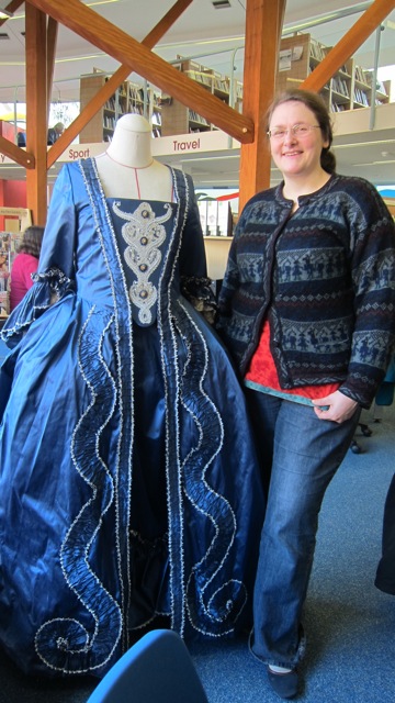 Costumier Helen McArdle showing her 1760s dress called a Mantua.