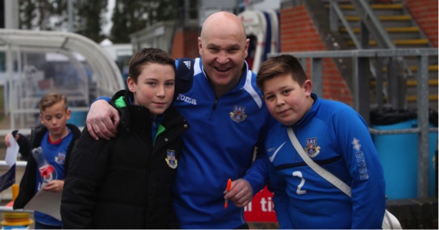 A delighted Richard Hill (Eastleigh Manager) has a few moments with two of Eastleigh’s Under 13 players after the game.Eastleigh 4 Macclesfield Town 0; 12:45 Saturday February 28th 2015