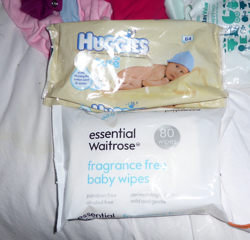 What are Huggies? Finding a similar pack gave it away. 