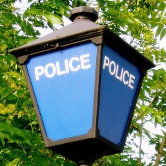 Police lamp image adapted from image by J D Mack via Flickr.
