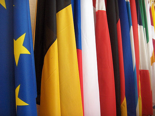 Flags of the European Union Members. Image by <a href="https://www.flickr.com/photos/friendly-fire/33431056/in/photolist-3XkTw-49JB98-q3T2W-85rYyr-6KnpEc-7y3GEX-9uhLp9-6KnrKT-b7T2L-bsm26R-Cv5sq6-ho25ZF-8DUxMY-9WmVKM-dPGiAB-518NwF-8DRyoZ-8DRw3i-vQ7Wjw-51o7Up-8ofXhv-bAHRgU-8s4uTN-ojL9NK-RecwG-8n25hm-9oevVo-sAFtQK-ojtwiP-sjeGg8-512Qvp-5ea3NH-sAFEQR-anXcK-4Wd2aK-nsMZeV-6KFk4A-cMm5dC-3JBMkQ-6NaYnK-98jRi8-2hDzyp-2hJ16L-6uNLxh-dmN9fy-7xumha-8ofWzD-7gK9og-Gg4WS-53fkaP">tristam sparks</a> via Flickr.