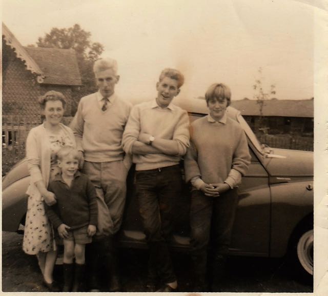 My dad, Mum, Heather, Brother Simon and me Probably around 1960/61. All leaning against my lively Morris Minor.