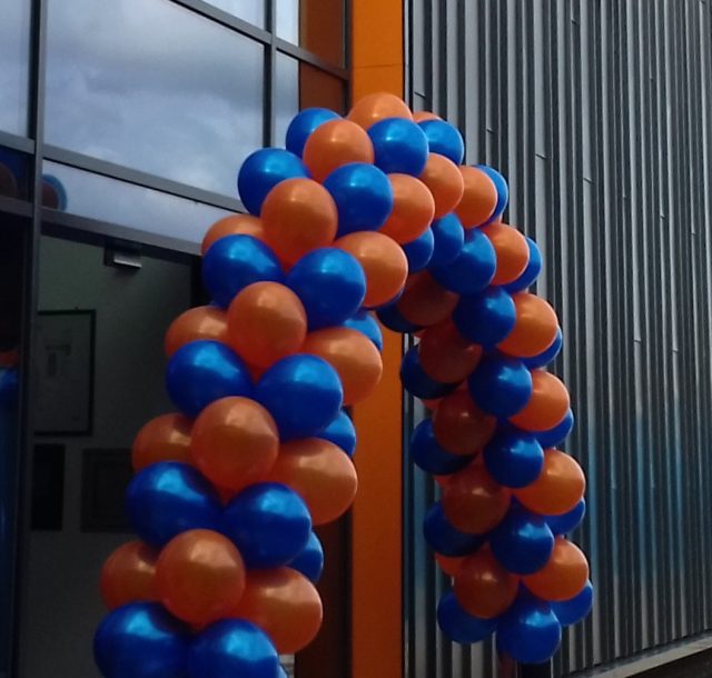 orange and blue balolons at the entrance