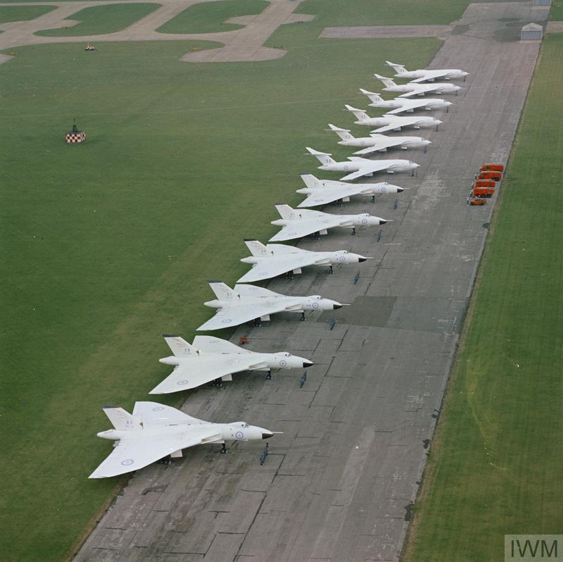 The Royal Air Force, 1950-1969 (RAF-T 5323) Six Avro Vulcan B.2 aircraft of No 617 squadron and six Handley Page Victor B.2 aircraft of either No 100 or No 139 Squadron (from RAF Witttering) lined up at RAF Scampton. These Vulcans and Victors are painted in their 'anti-flash' white paint-scheme. Copyright: © IWM (RAF-T 5323) 