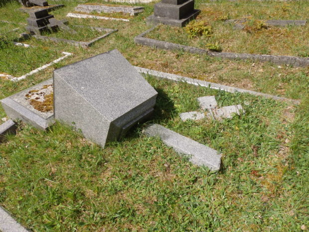 Pine Road Cemetery monument laid to the ground