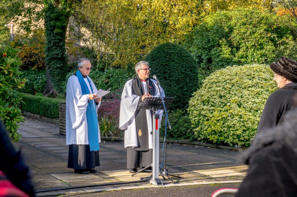 The Rev’d Ian Bird (Vicar) with Rob Hayter (Reader). Remembrance Sunday 2019, Chandler's Ford, Eastleigh. Image credit: Debbie Pearce Photography 